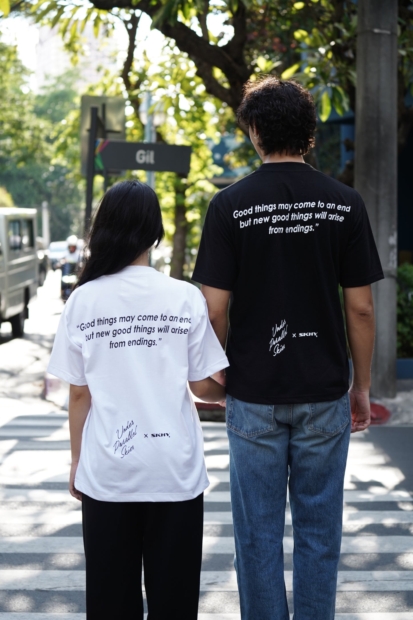 Under Parallel Skies White Logo Tee
