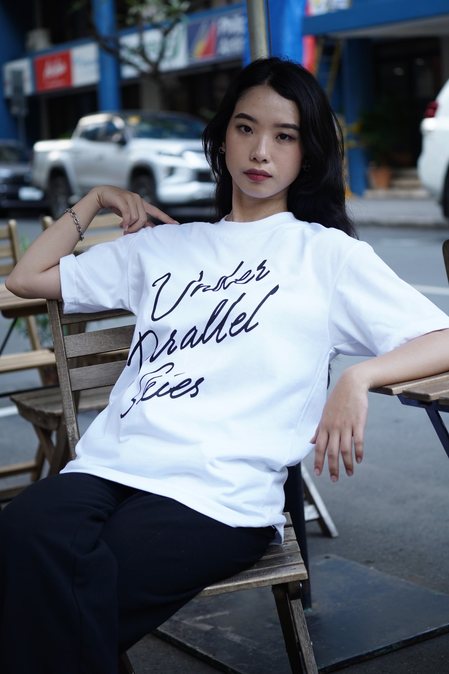 Under Parallel Skies White Logo Tee