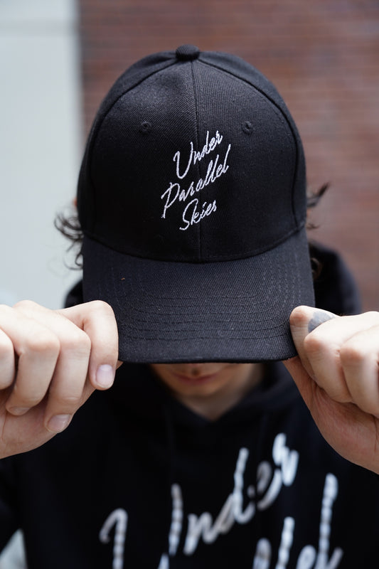 Under Parallel Skies Logo Black Cap