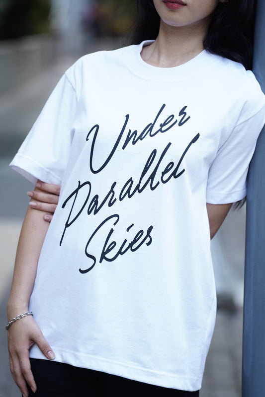 Under Parallel Skies White Logo Tee