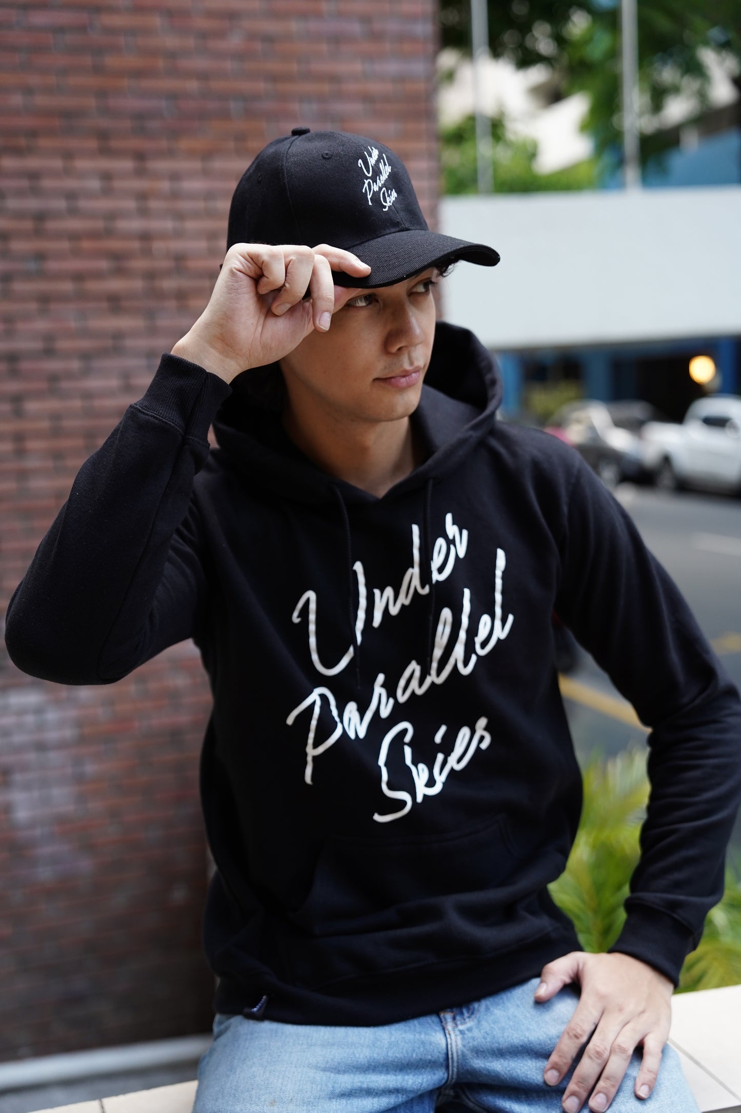 Under Parallel Skies Logo Black Cap